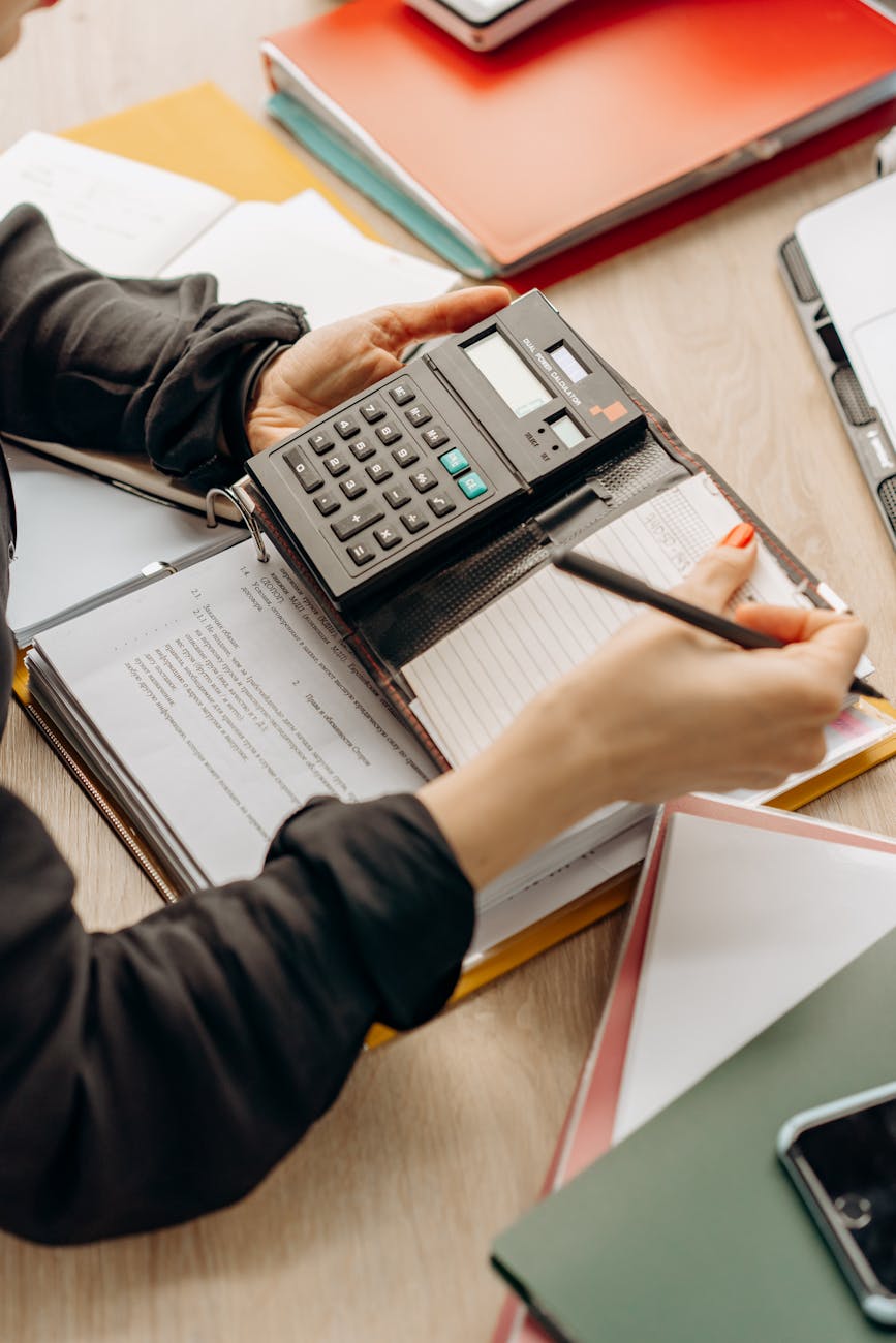 a person using a calculator